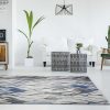 8'x11' Grey Navy Machine Woven Oversized Leaves Indoor Area Rug - Image 2