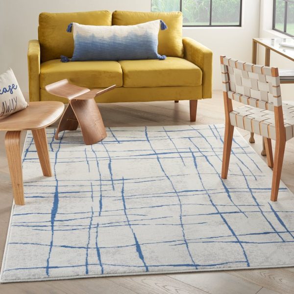 6?x 9?Ivory and Blue Irregular Grids Area Rug - Image 3