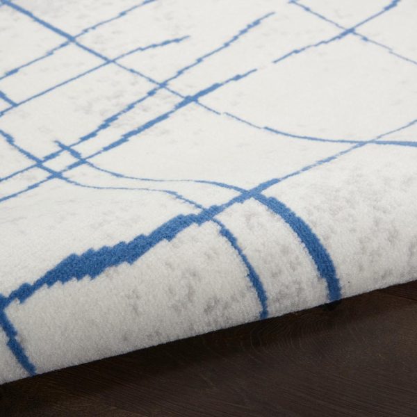 6?x 9?Ivory and Blue Irregular Grids Area Rug - Image 5