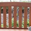 Curved Back 4-Ft Outdoor Garden Bench with Arm-Rests in Natural Wood Finish - Image 2